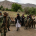 The Taliban Prison Uprising: How CIA Operatives Faced Chaos and Tragedy in the Hunt for Bin Laden 15 | Mania Africa | maniainc.com Northern Alliance officers at the site of the Qala-i-Jangi Prison Uprising in 2001 - How CIA Operatives Faced Chaos and Tragedy in the Hunt for Bin Laden
