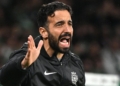 A picture of new Manchester United coach Ruben Amorim instructing players on the pitch during a past match | A New Coach For Man United... Finally | Premier League commentary on Mania Sports | maniainc.com/sports