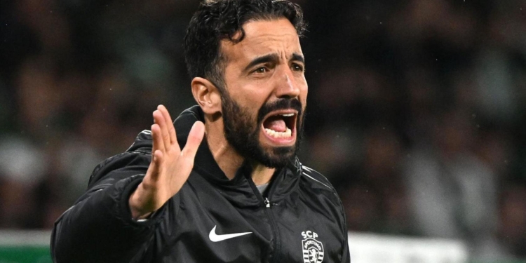 A picture of new Manchester United coach Ruben Amorim instructing players on the pitch during a past match | A New Coach For Man United... Finally | Premier League commentary on Mania Sports | maniainc.com/sports