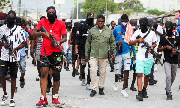 Gangs and Insecurity: Investigating the Root Causes of Instability in Haiti 7 | Mania Africa | maniainc.com Haiti's most notorious gang leader Jimmy “Barbecue” Cherizier | Root Causes of Haiti's Instability: A Deep Dive into The Rise of Gangs and Insecurity in Haiti | Mania News