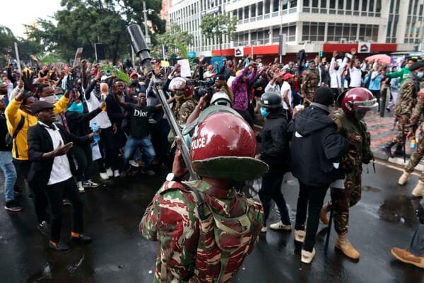 Are Kenyan Gen Z Protestors Suffering from Stockholm Syndrome? Uncovering the Emotional Toll of Fear and Repression 14 | Mania Africa | maniainc.com Gen Z protestors trying to negotiate with anti-riot police | Are Kenyan Gen Z Protestors Suffering from Stockholm Syndrome? Uncovering the Emotional Toll of Fear and Repression | Mania Politics