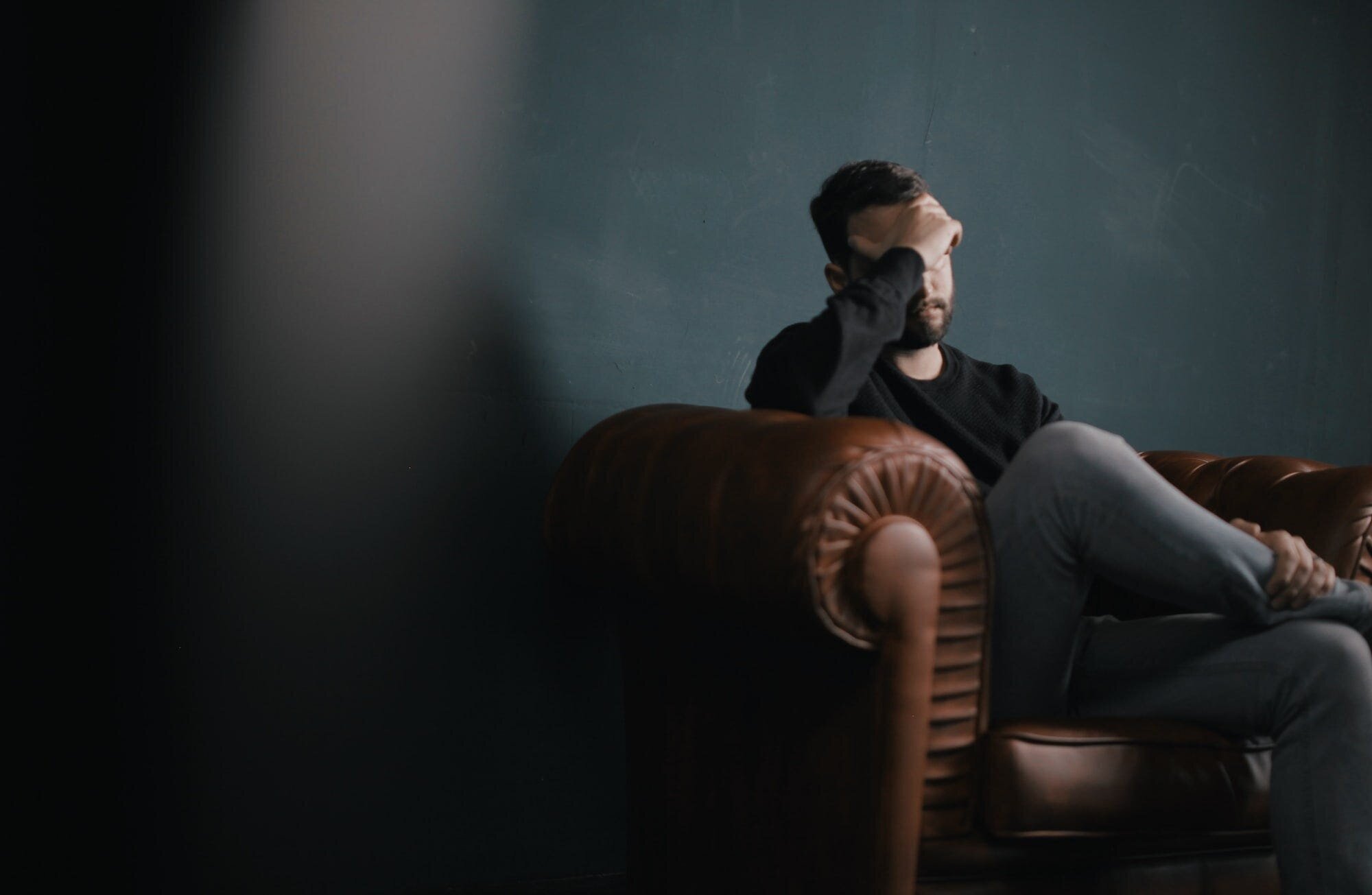 How to Move On After a Breakup When You Still Love That Person: A Comprehensive Guide to Healing and Letting Go 4 | Mania Africa | maniainc.com An image of an individual in a counseling session trying to move on after a breakup while still loving their ex