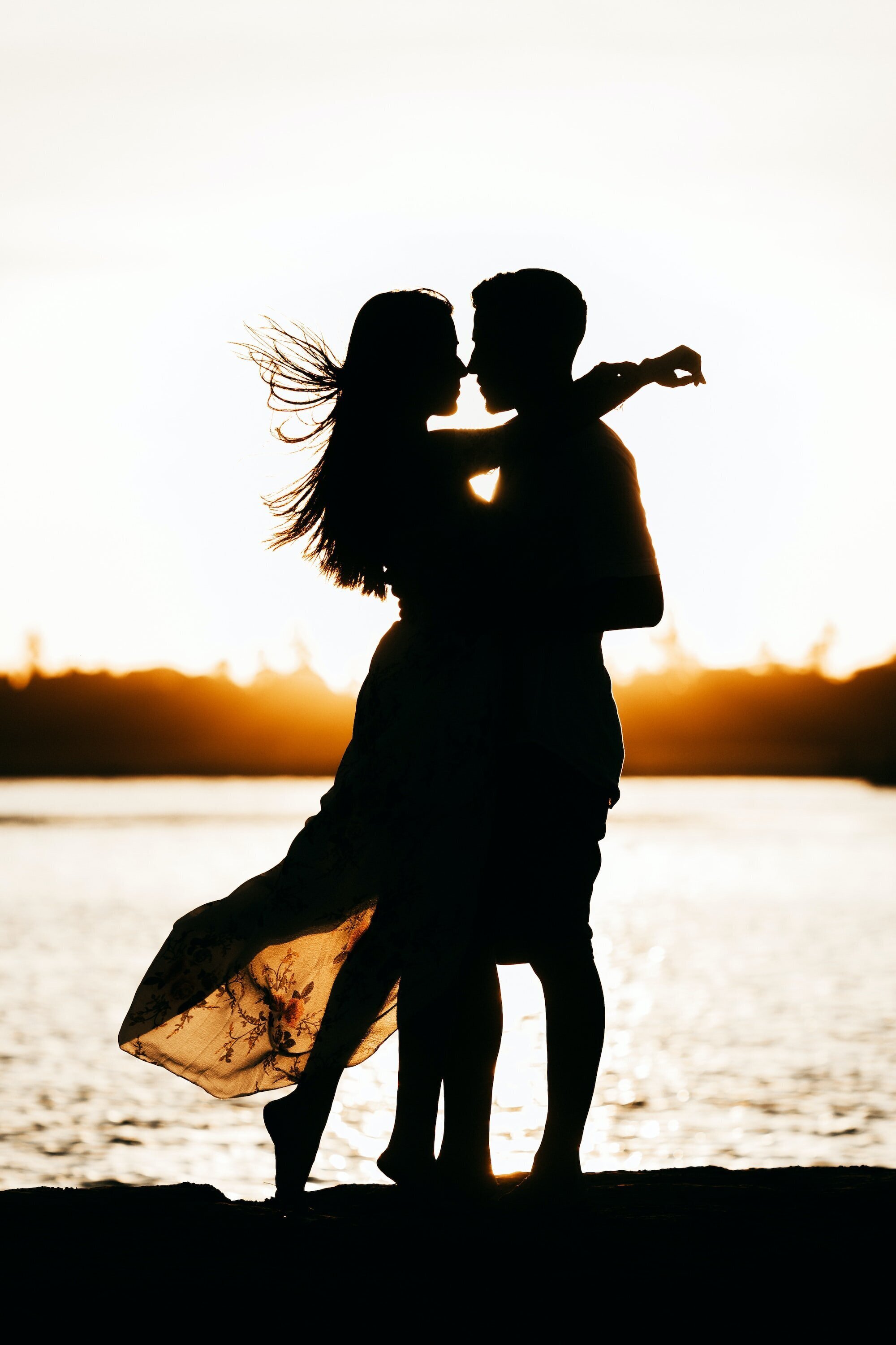 The Sex Diaries #2: How to be Comfortable with Being Naked Around Your Partner 4 | Mania Africa | maniainc.com The silhoutte of a man and a woman by the water holding one another