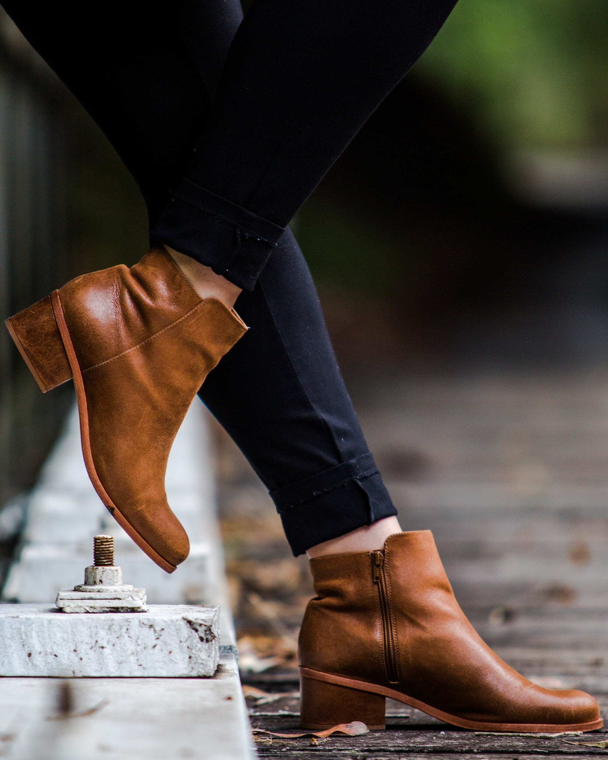 No More Hassle: The Ultimate Guide to Choosing and Wearing Laceless Shoes 4 | Mania Africa | maniainc.com A woman wearing brown laceless boots