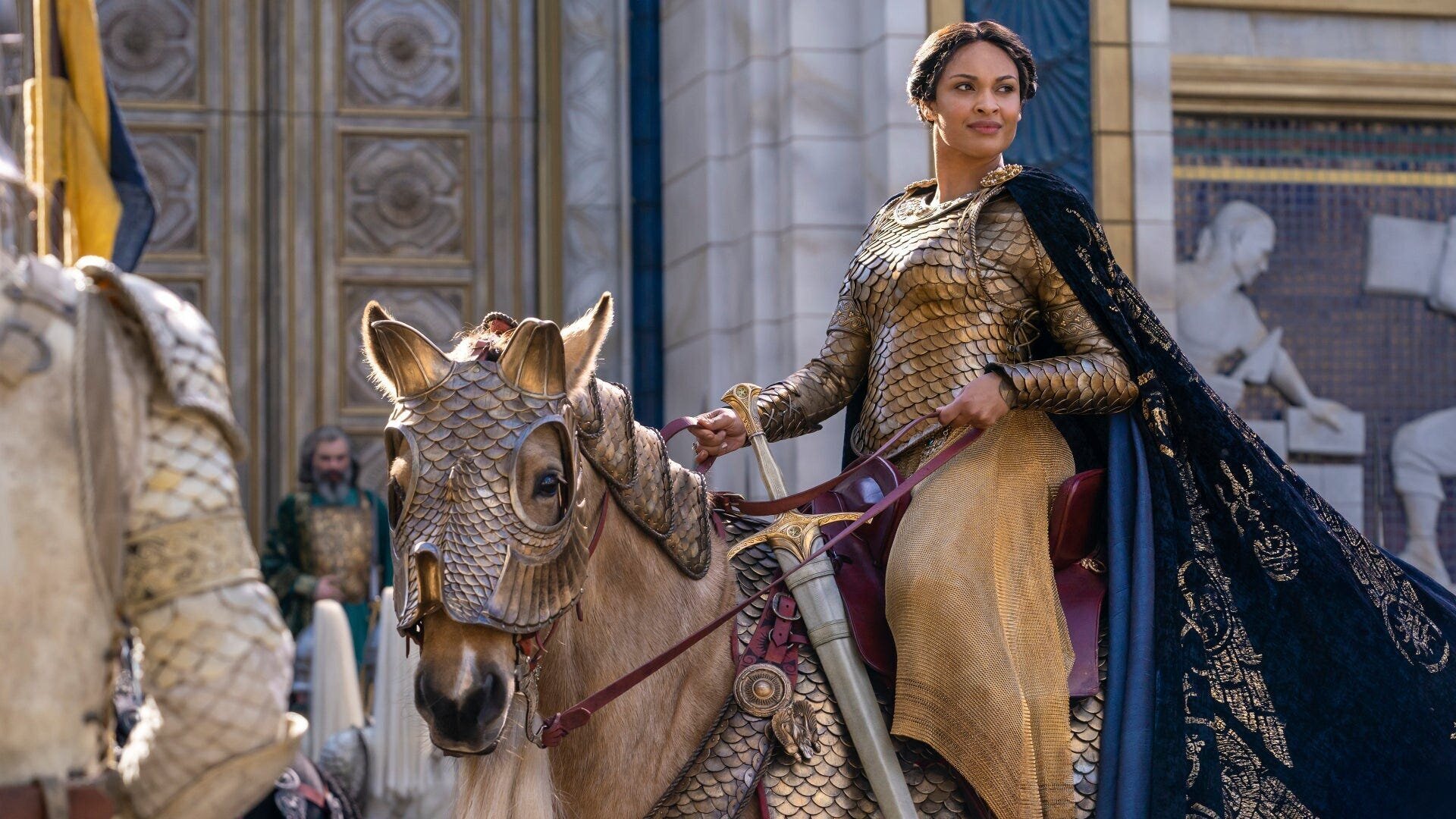 The Lord of the Rings: The Rings of Power Series Review 3 | Mania Africa | maniainc.com Queen Miriel on horseback as she leads Numenorian soldiers to war in the Southlands