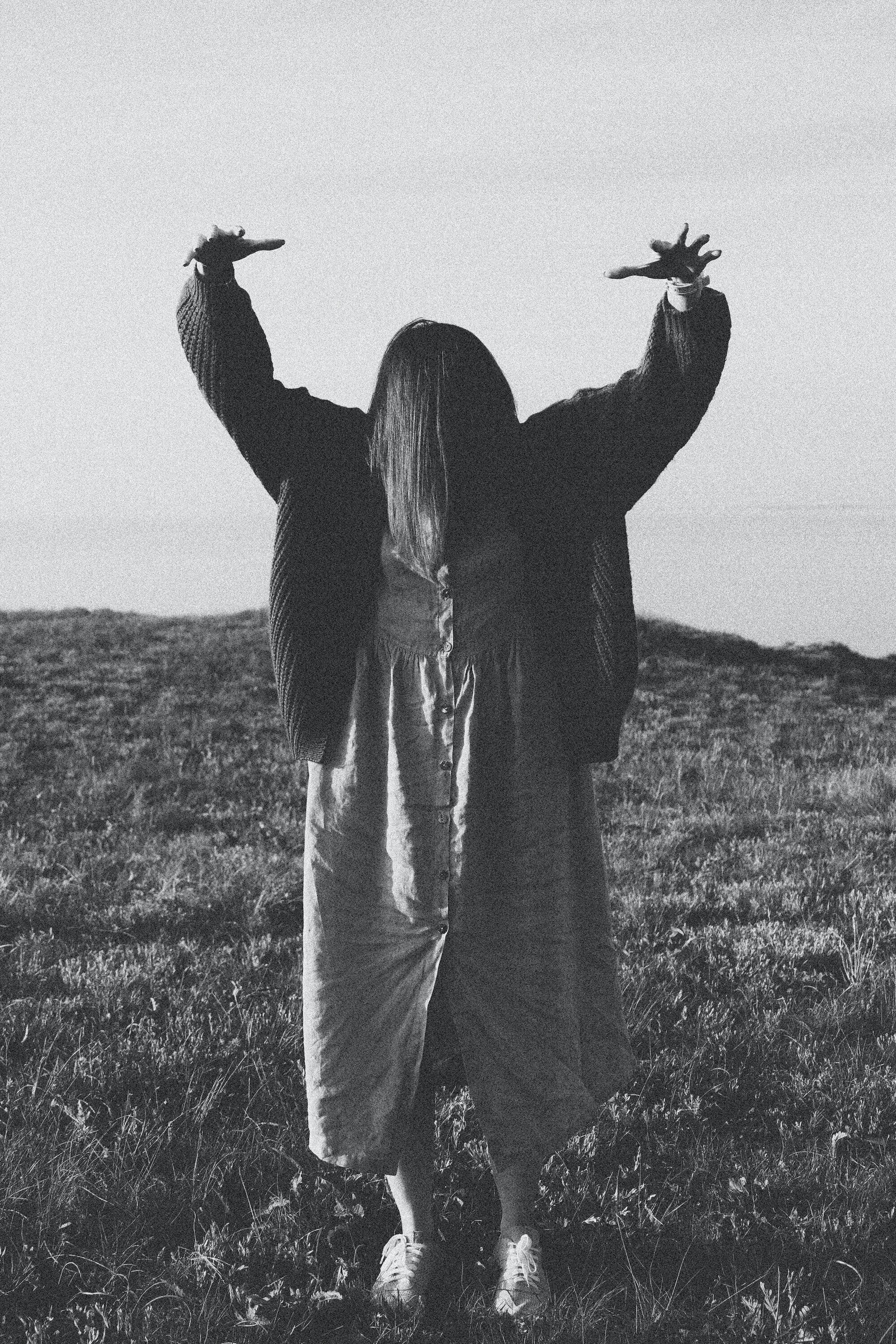 The Truth About Cults: How They Work, Why People Join, and How to Avoid Falling Victim 2 | Mania Africa | maniainc.com A woman creepily posing with her head down as if possessed and in a cult
