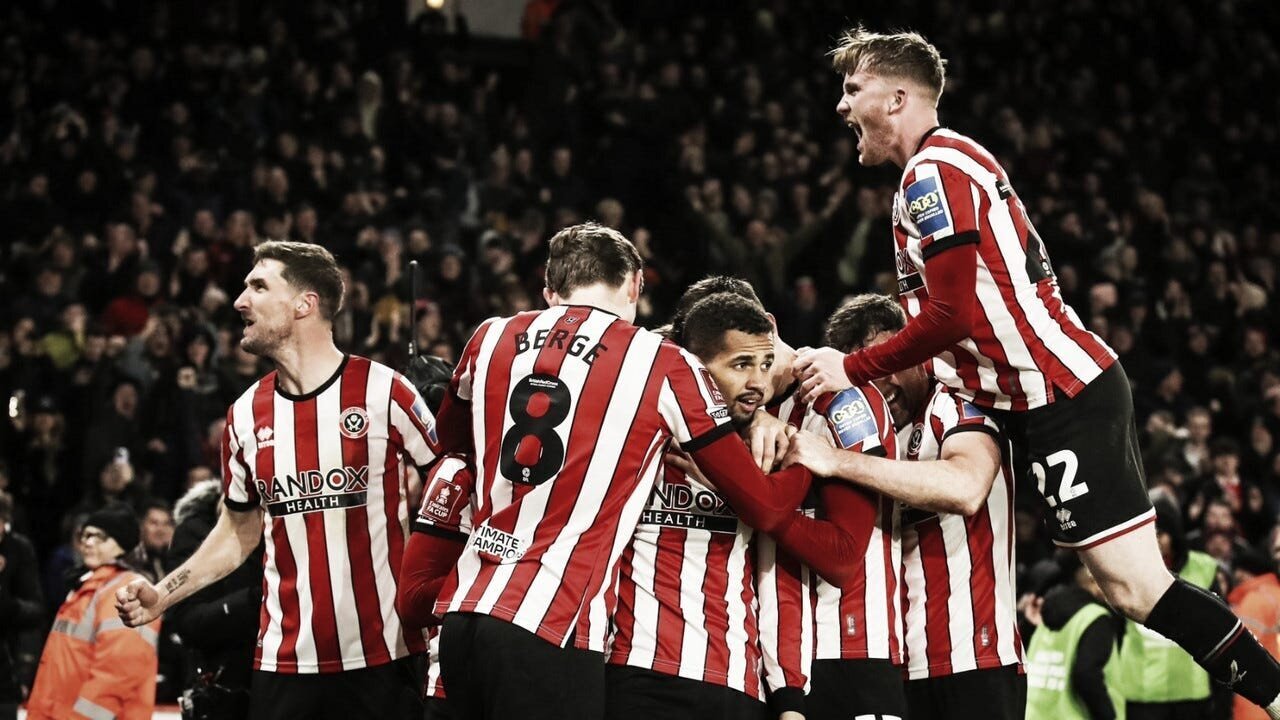 Manchester United and Manchester City Bulldoze their Way to the FA Cup Semi-Finals 5 | Mania Africa | maniainc.com Sheffield United's players celebrating a goal against Blackburn Rovers