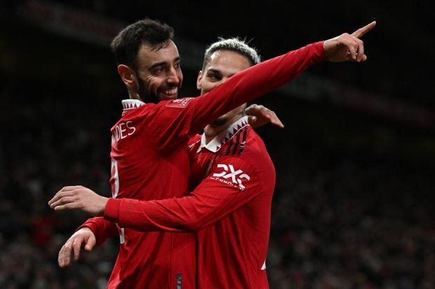 Manchester United and Manchester City Bulldoze their Way to the FA Cup Semi-Finals 4 | Mania Africa | maniainc.com Bruno Fernandes celebrating his goal against Fulham with teammate Antony