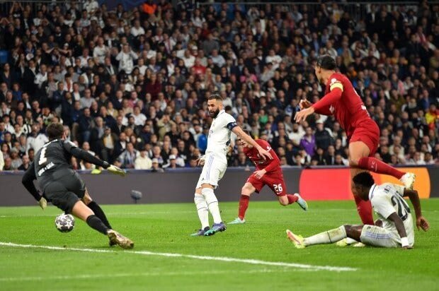 Real Madrid and Napoli Proceed to the UEFA Champions League Quarterfinals as Liverpool Fails to Correct their Leg 1 Mistakes 2 | Mania Africa | maniainc.com Vinicius Jr. the moment he passes the ball to Benzema who then scores in their UCL Round of 16 Leg 2 game against Liverpool