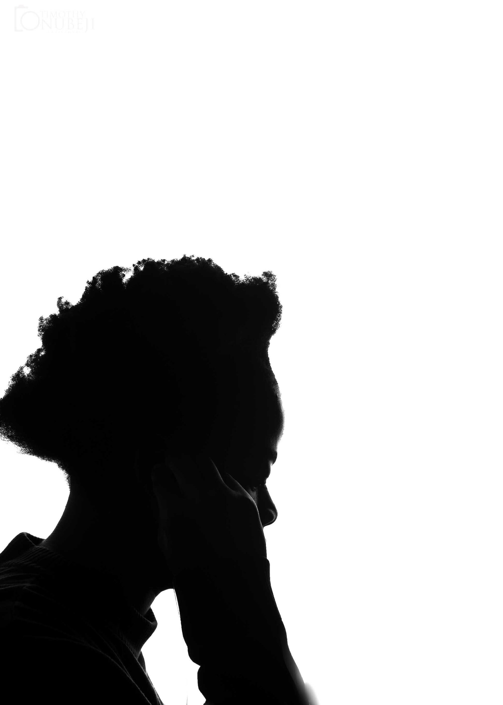 Exploring the Power of Thought: From Brain-Machine Interfaces to Genetics and Aging 2 | Mania Africa | maniainc.com A photo of the silhouette of a woman who is deep in thought