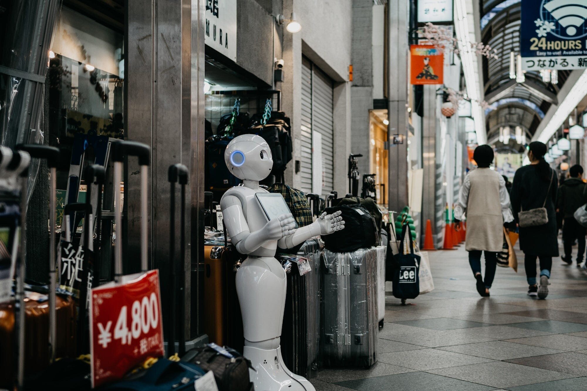 The Latest Developments and Applications of AI: How it's Changing Our World 3 | Mania Africa | maniainc.com A Robot in a Shopping Mall in Kyoto