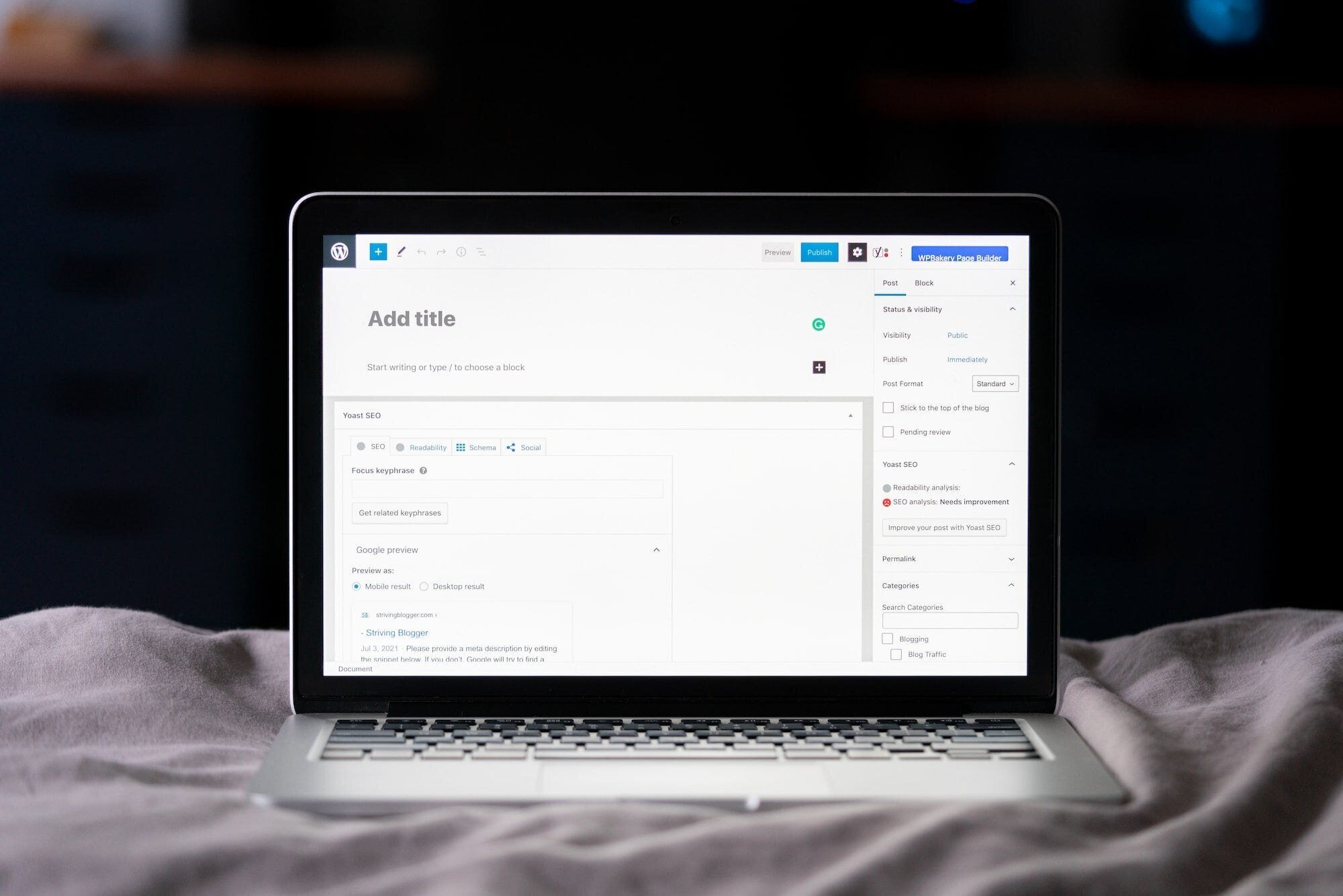 Maximizing Your WordPress Site's Performance: 7 Essential Optimization Techniques 3 | Mania Africa | maniainc.com WordPress add a new post screen, with a laptop on the bed.