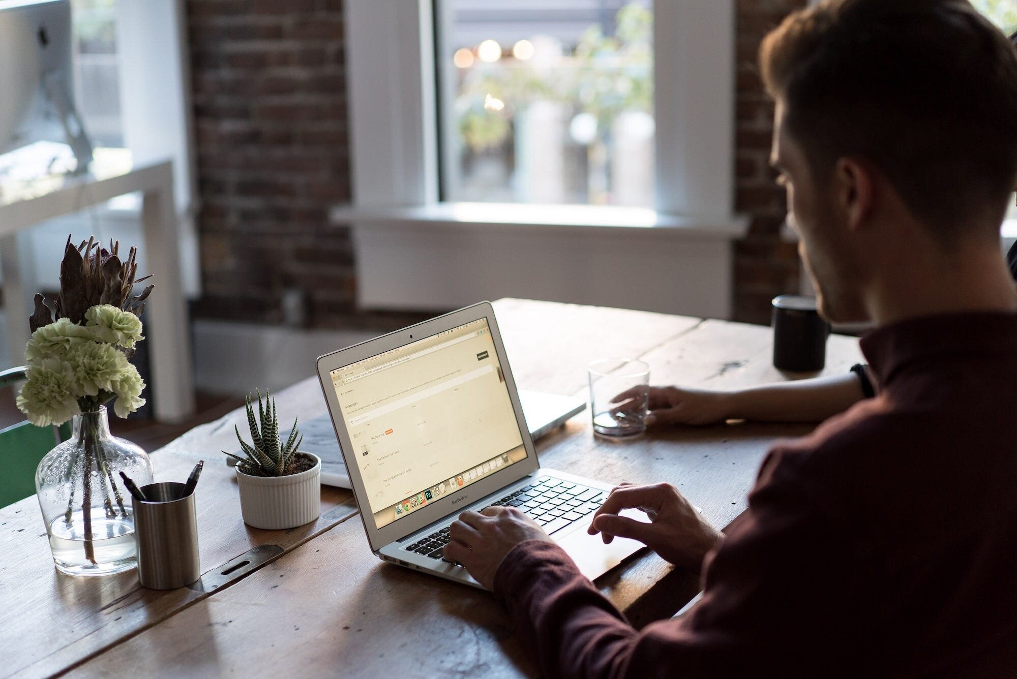 How to Get a Stripe Account in an Unsupported Country Using Stripe Atlas: A Guide for Creators 4 | Mania Africa | maniainc.com An individual using his laptop. Creators can use Stripe Atlas to set up an US business online and start enjoying the benefits of stripe