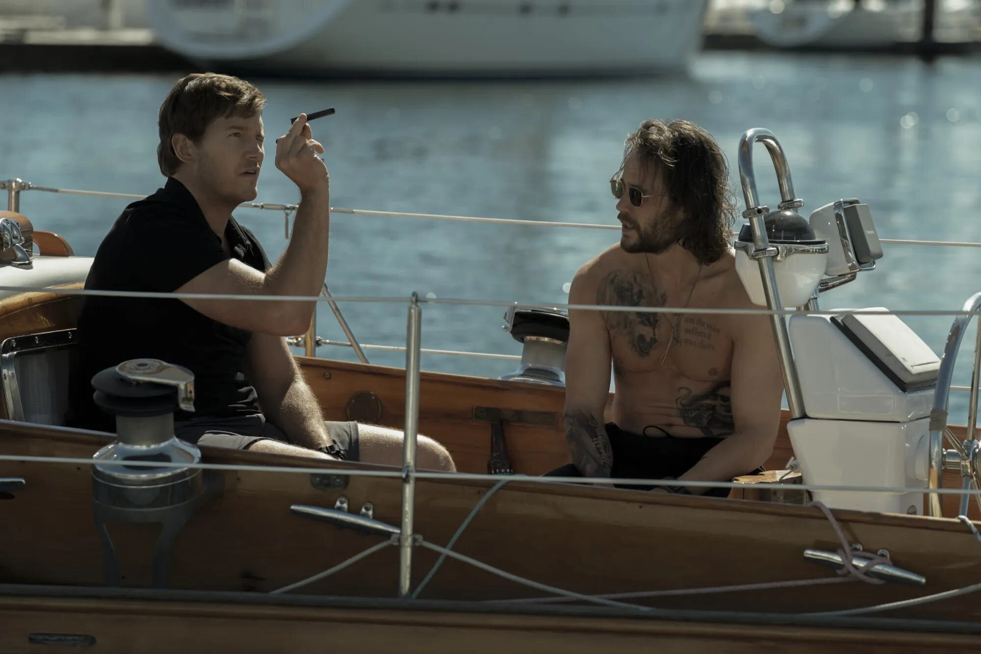 The Terminal List Season 1 Series Review 5 | Mania Africa | maniainc.com James and Ben on Ben's boat preparing the hit on SecDef