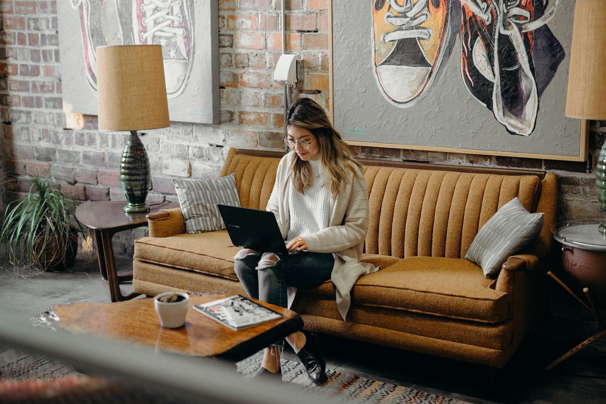 Remote Work: Benefits and Drawbacks for Employees and Employers 3 | Mania Africa | maniainc.com A woman working from home