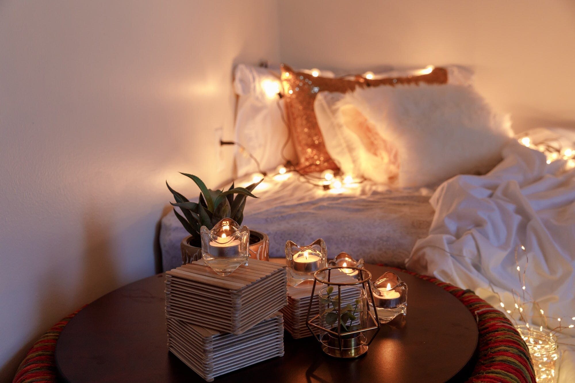 The Sex Diaries #1: How to Know What You Like During Sex 4 | Mania Africa | maniainc.com a cozy boho room decor with candles and string lights