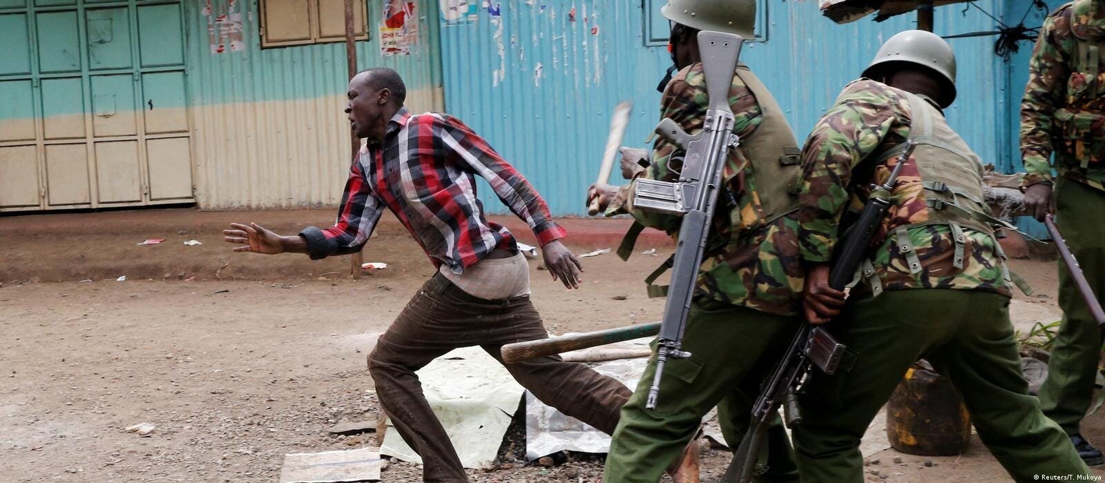 Maandamano Thursday in Kenya: Raila Odinga Survives Assassination Attempt Amidst Violent Protests 2 | Mania Africa | maniainc.com A protestor running from police officers who are clobbering him with batons
