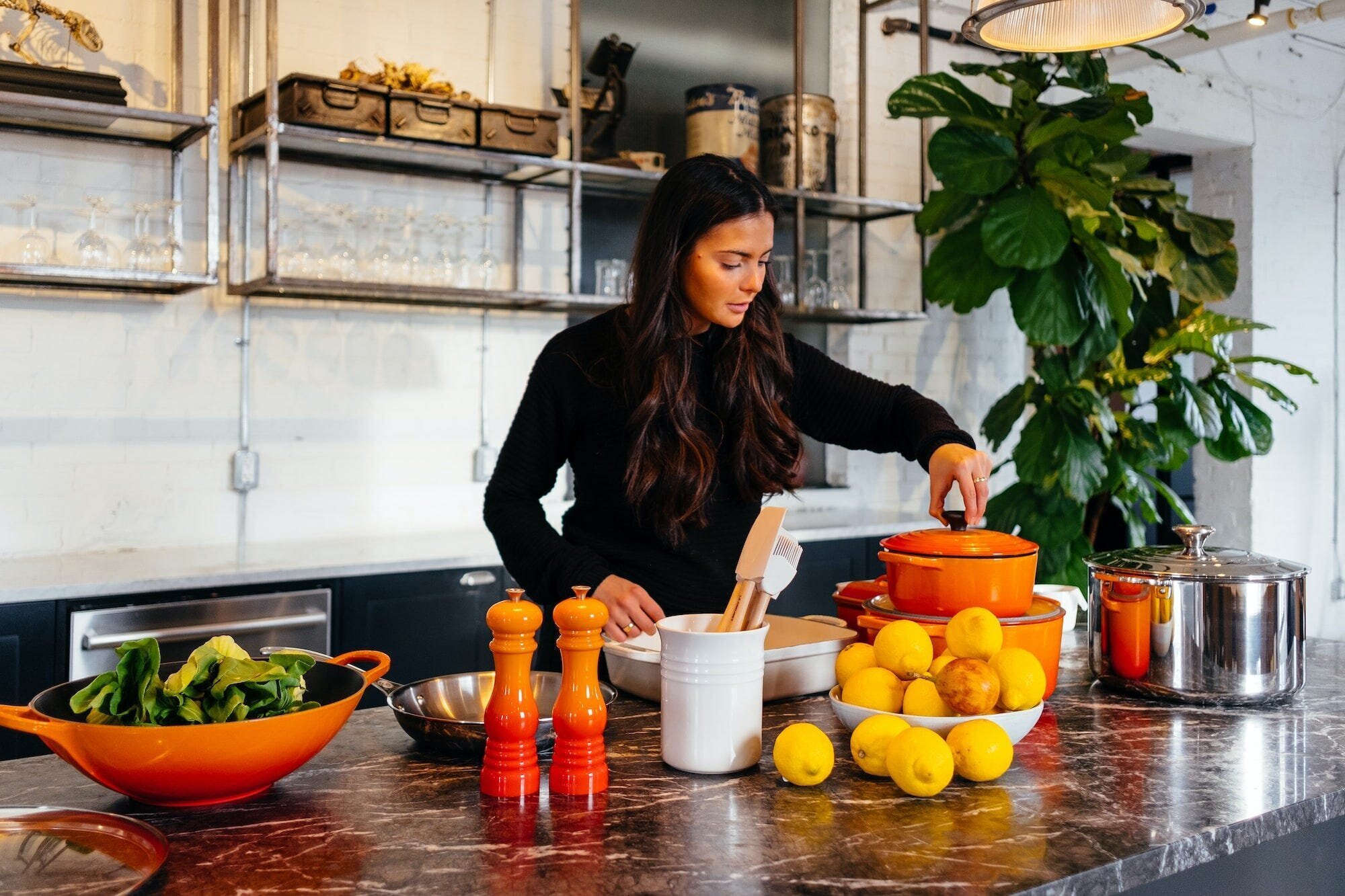 Protein Allergy? No Problem: Exploring the Best Alternative Sources of Protein for Your Diet 8 | Mania Africa | maniainc.com A woman in the kitchen preparing a meal