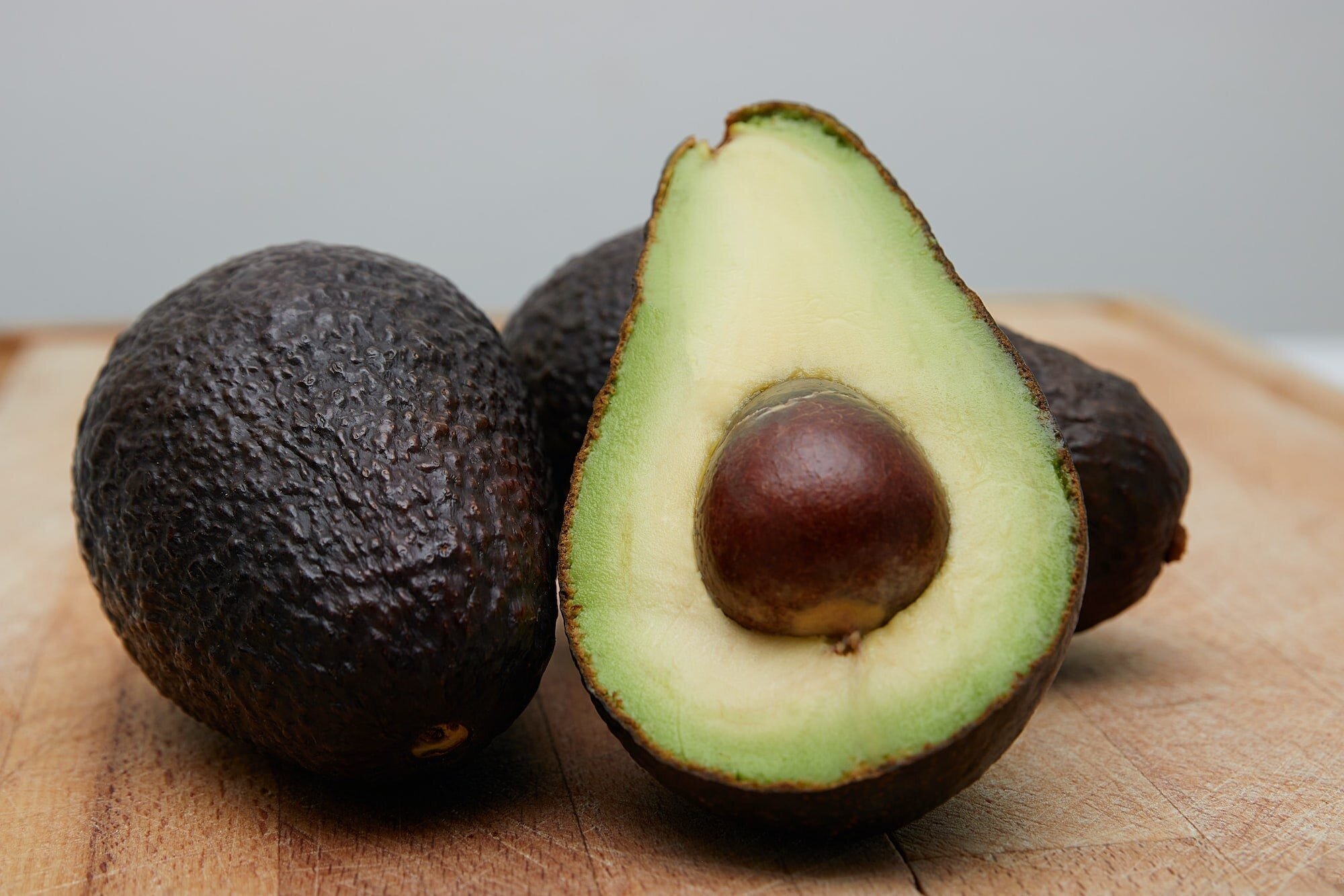 How to Ripen Avocados Fast: Proven Methods for Perfectly Ripe Avocados 9 | Mania Africa | maniainc.com Freshly cut avocados. Heating can be used as a way to ripen avocados fast but isn't the best option