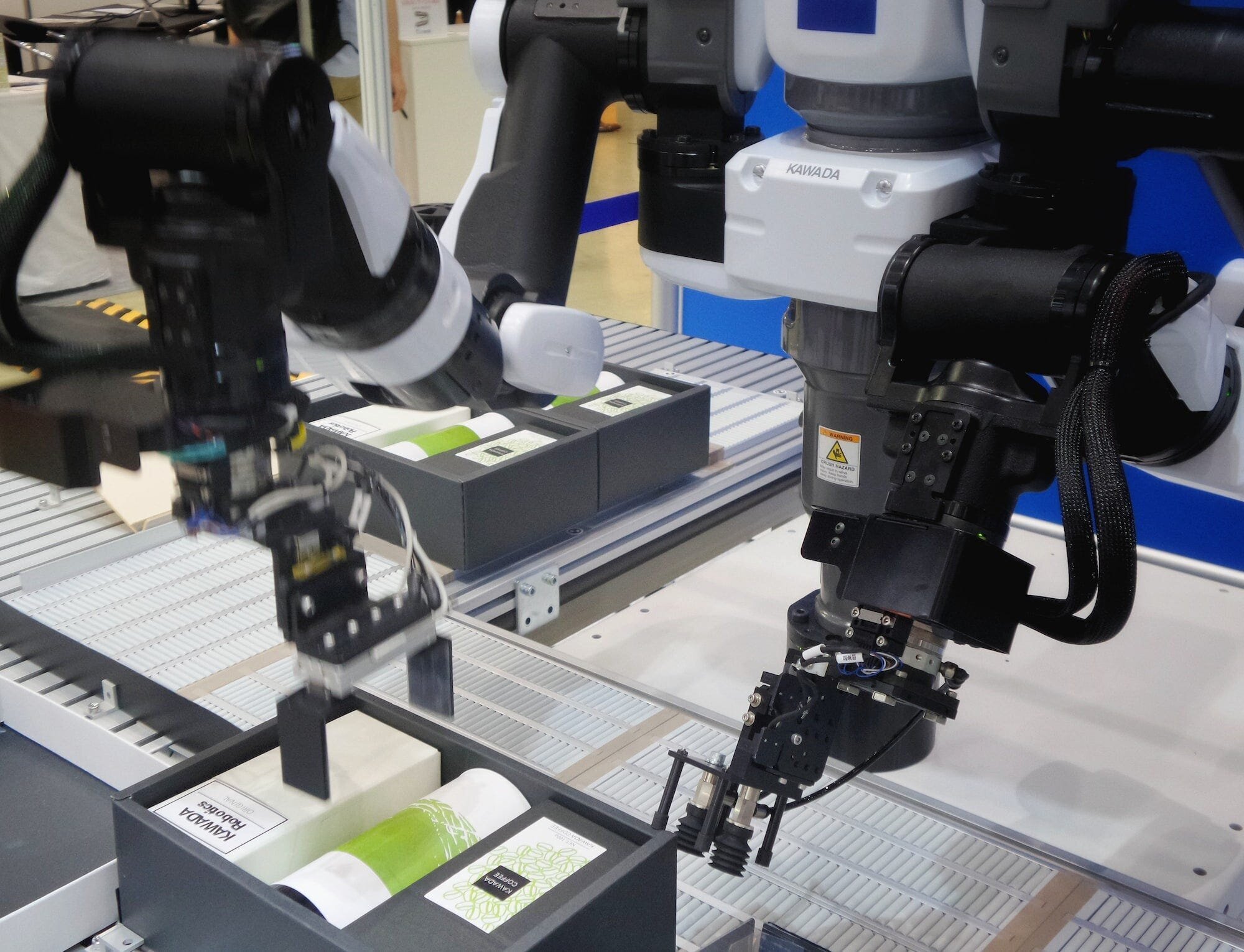 The Latest Developments and Applications of AI: How it's Changing Our World 2 | Mania Africa | maniainc.com A robot packing products into boxes