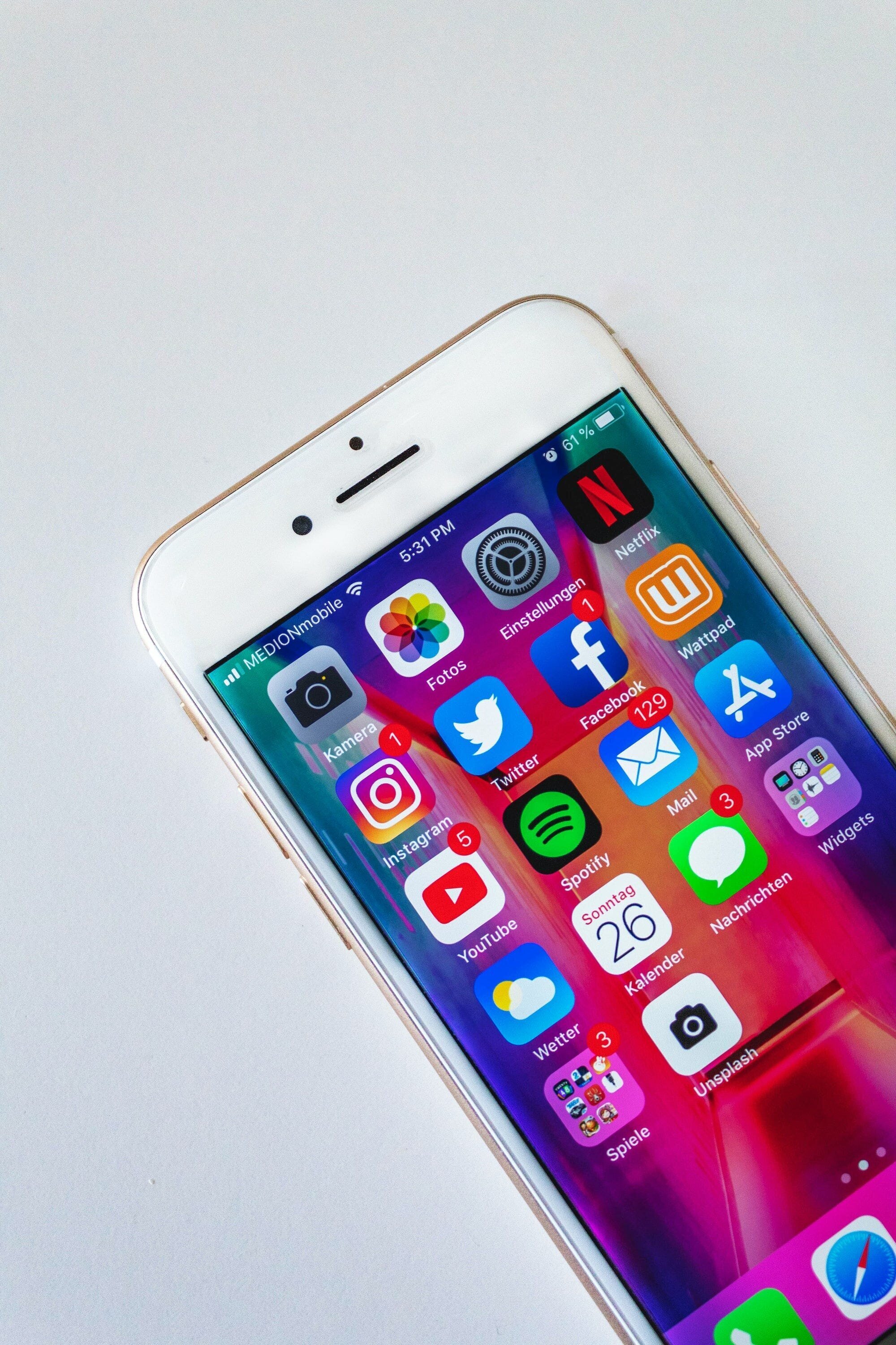 The Impact of Social Media on Mental Health: Navigating the Risks and Benefits 4 | Mania Africa | maniainc.com An image of several social media apps on an iPhone
