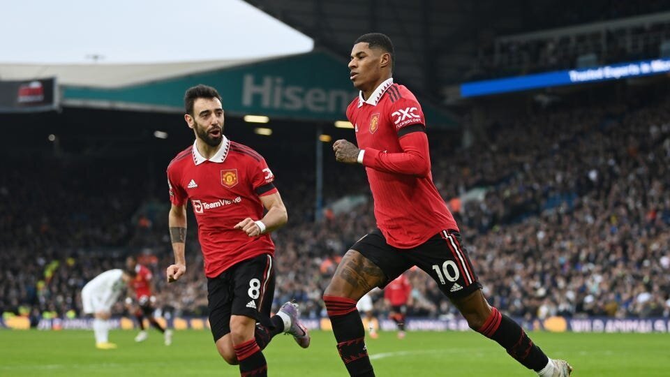 Liverpool, Man City, and Man Utd Shine Plus EPL GW 23 Results 2 | Mania Africa | maniainc.com Manchester United's Marcus Rashford and Bruno Fernandes celebrating a goal against Leeds United in EPL GW 23