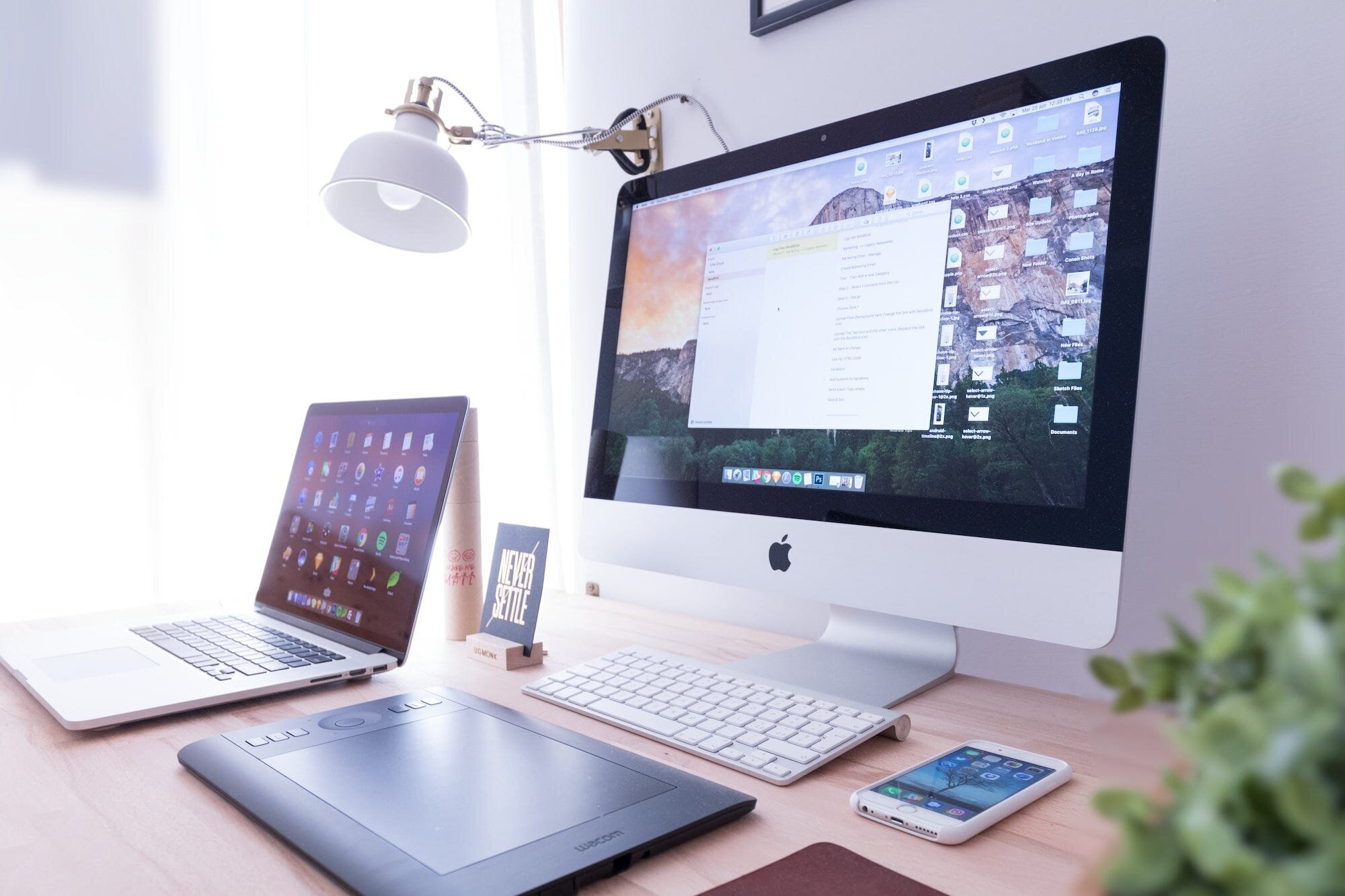 An image of several devices on a desk. Honeygain users can maximize earnings by installing multiple devices