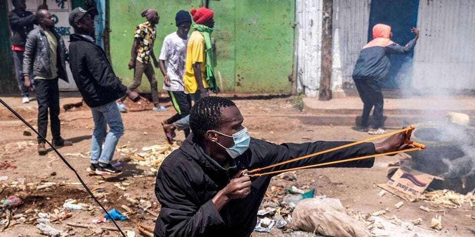 Maandamano Thursday in Kenya: Raila Odinga Survives Assassination Attempt Amidst Violent Protests 3 | Mania Africa | maniainc.com A protestor using a sling to hurl stones at Police
