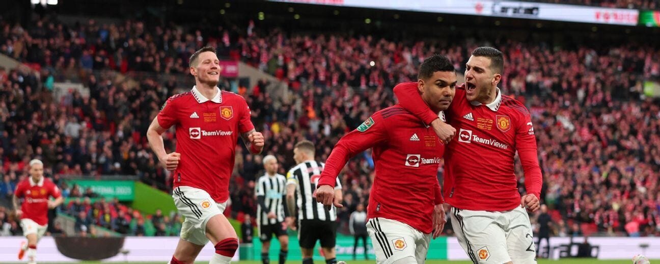 Manchester United Win the 2023 Carabao Cup in What is the First Cup Win for Manager Erik ten Hag as Tottenham Beat Chelsea in the EPL 2 | Mania Africa | maniainc.com Man Utd player Casemiro celebrating his goal against Newcastle United alongside two of his teammates