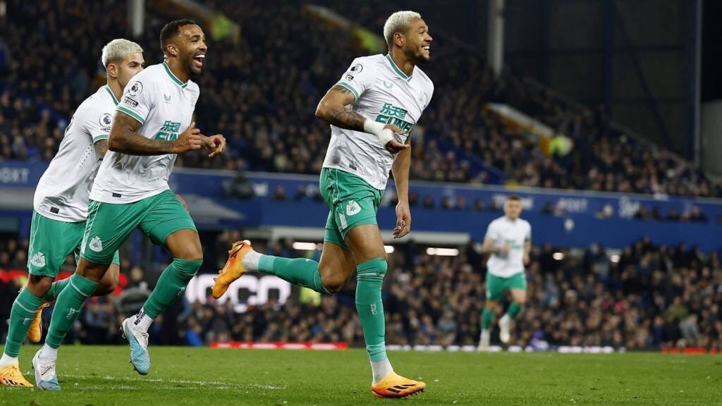Newcastle's players Joelinton and Callum Wilson celebrating a goal against Everton