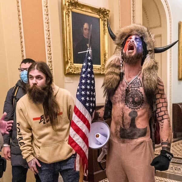 2024 Presidential Showdown – Harris vs. Trump: Latest Updates and Insights 41 | Mania Africa | maniainc.com Jacob 'Jake' Angeli during the Jan 6 Insurrection | 2024 Presidential Showdown – Harris vs. Trump: Latest Updates and Insights | Mania News