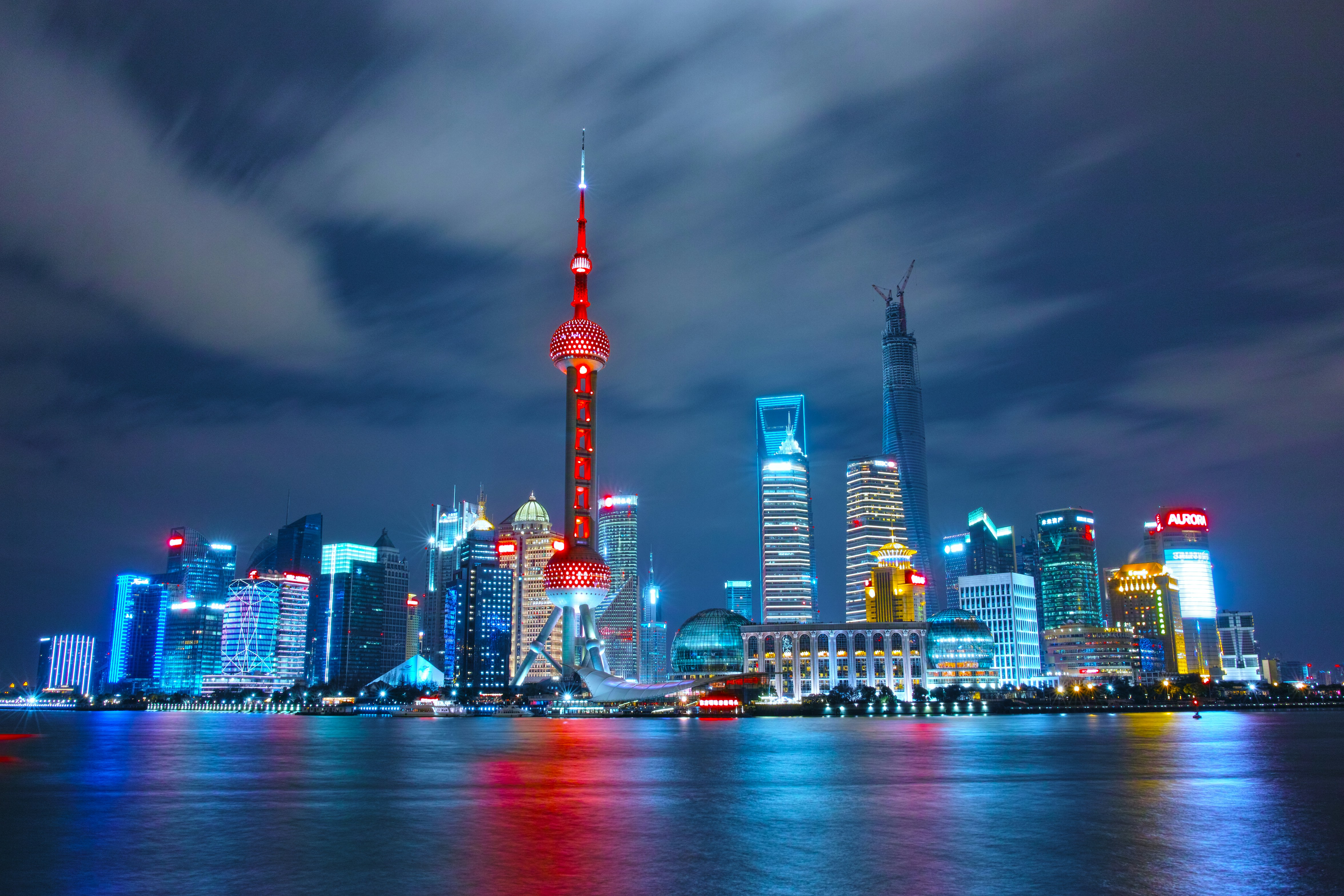 Middle-Income Trap, 3i Strategy Skyscrapers in Shangai at night | What is the "Middle-Income Trap"? | Mania Business