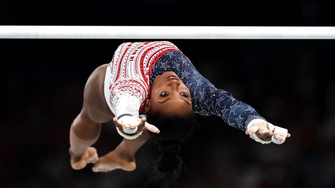 Simone Biles: How She Became the Most Decorated U.S. Gymnast of All Time 2 | Mania Africa | maniainc.com Simone Biles in her routine during the Paris 2024 Olympics | Breaking Records and Making History: Simone Biles