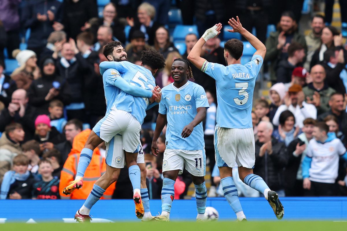 Double Loss for League Contenders Liverpool and Arsenal in a Seeming Repeat of Last Season's Misfortune 5 | Mania Africa | maniainc.com Man City players celebrating a goal as they clobbered Luton Town 5-1, effectively securing a lead in the EPL Table | Will Man City Win the EPL 2023/24? | Mania Sports