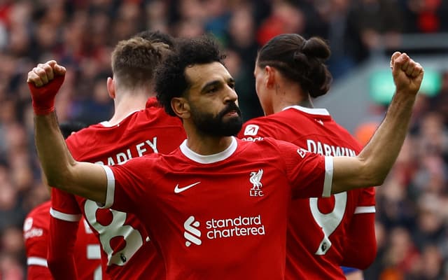 EPL Matchday 30 Results: Arsenal Draw Man City as Liverpool Beat Brighton 3 | Mania Africa | maniainc.com | Salah celebrating his goal against Brighton in EPL Matchday 30 | Premier League Results | Mania Africa