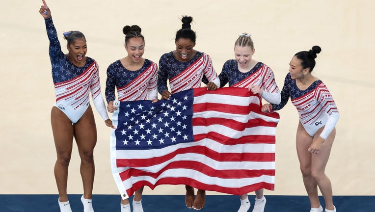 Simone Biles: How She Became the Most Decorated U.S. Gymnast of All Time 6 | Mania Africa | maniainc.com Simone Biles and her teammates in the 2024 Olympics where they won Gold | How Many Olympic Medals Has Simone Biles Won in Total? | Mania Sports