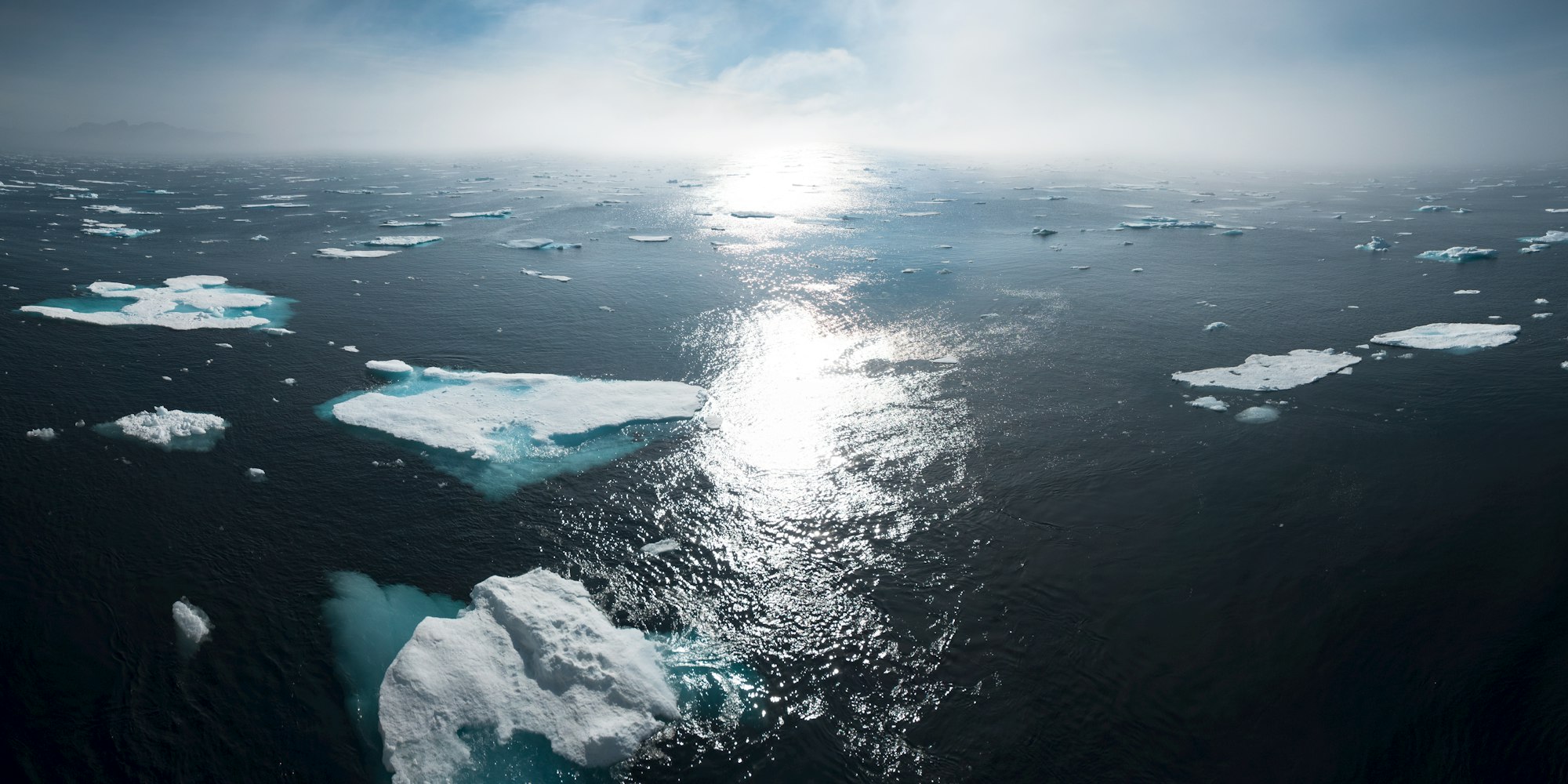 The Urgent Realities of Climate Change: Facts and Solutions for a Sustainable Future 2 | Mania Africa | maniainc.com Icebergs on water | Understanding the Urgent Realities of Climate Change | Mania Africa