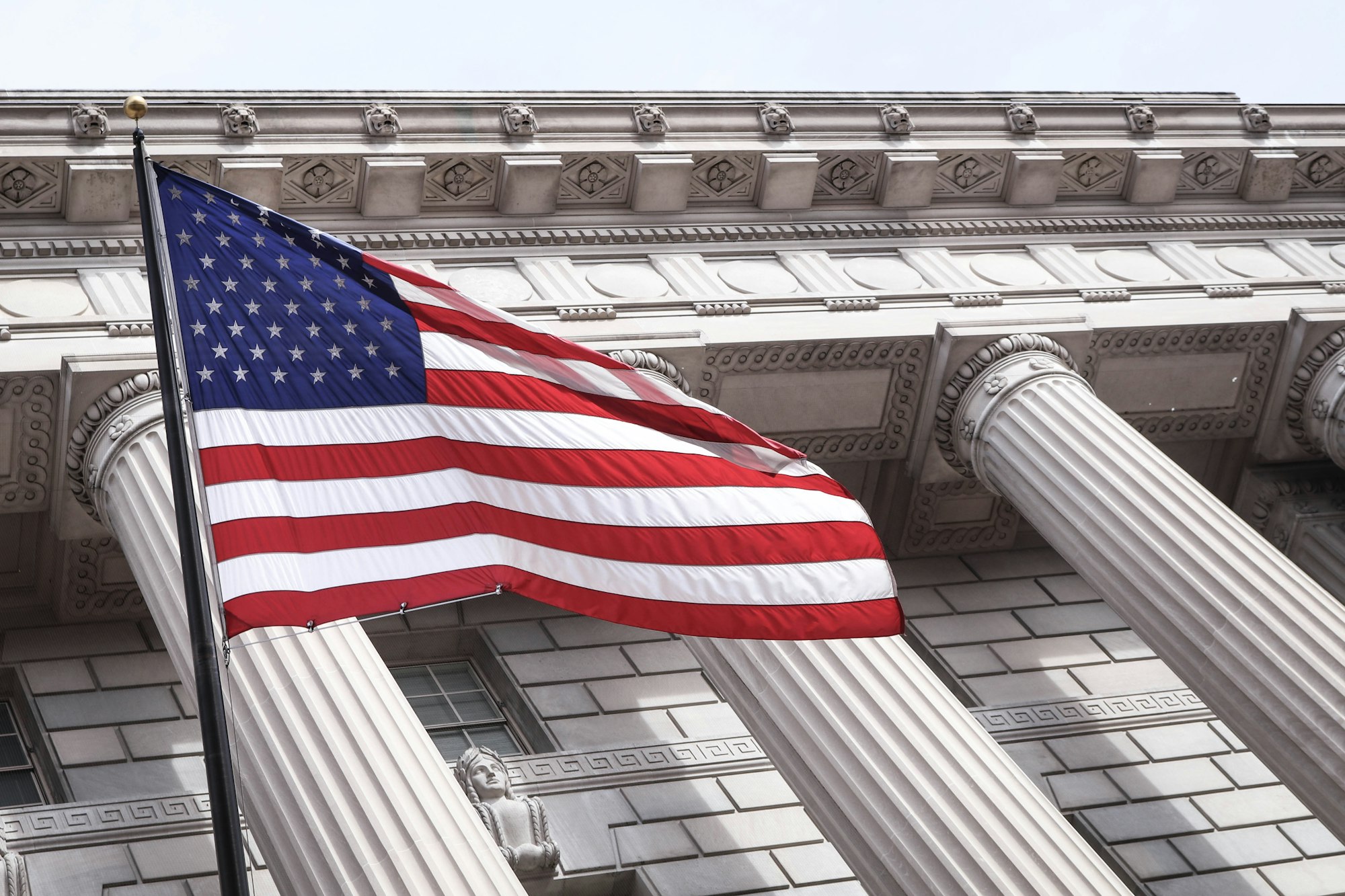 Trump and Musk Unplugged: A Candid X Spaces Conversation on Power, Policy, and the Future of America 49 | Mania Africa | maniainc.com USA flag near municipal building | Both Trump and Elon Musk came through as deeply patriotic during the X Space discussion, sharing deep seat admiration for American values | Trump X Space | Mania News