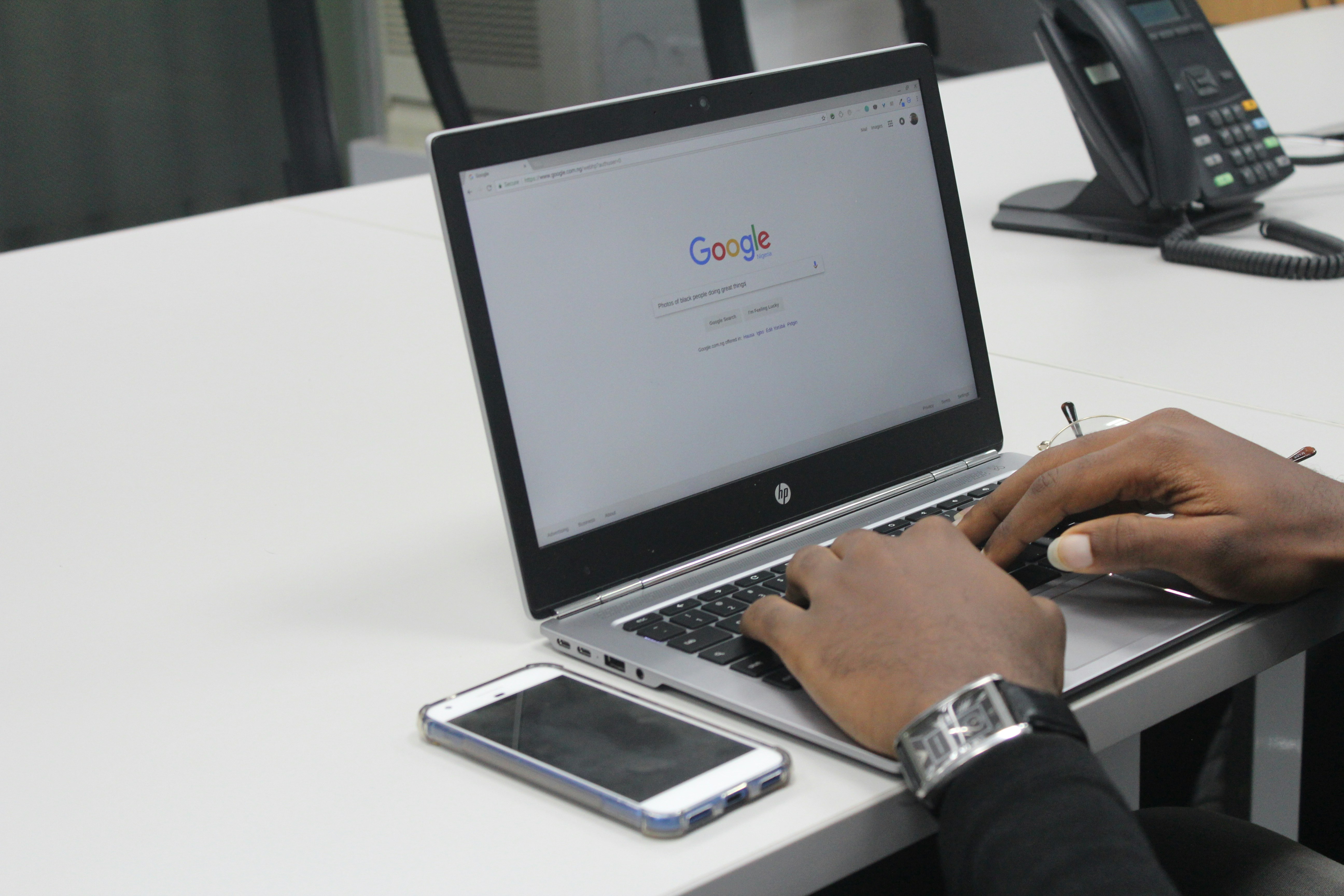 A person using Google Search | Write for People: Don't Chase Search Engines and Algorithms | Ultimate Blogging Guide for Beginners | Mania Africa