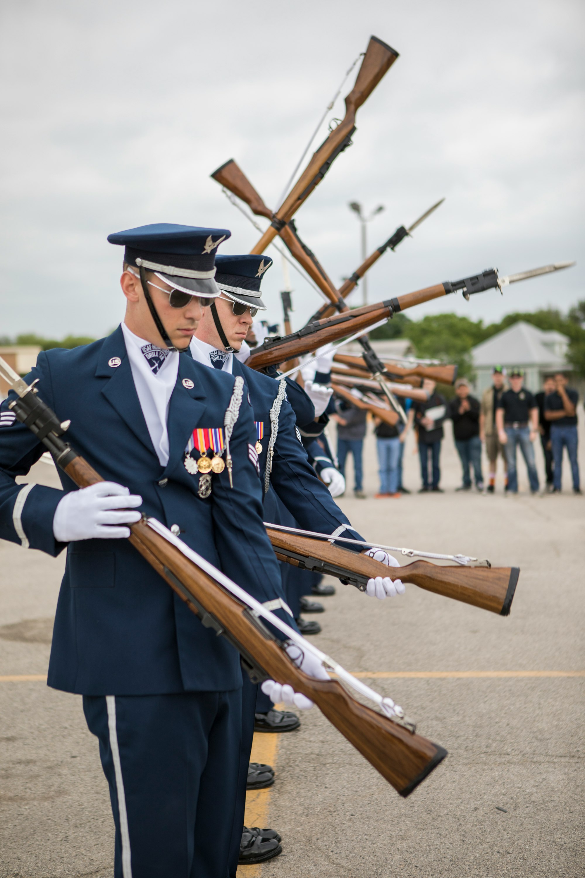 Conspiracy Theories and Extremism: Is a Civil War Looming in America? 13 | Mania Africa | maniainc.com A closeup photo of military officers holding guns | Rise of the Militia: Is a Civil War Looming in America? | Mania Politics