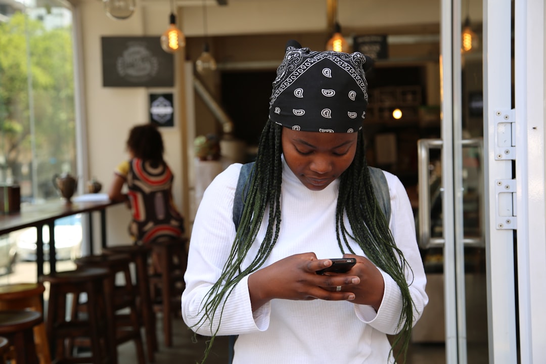 The Sex Diaries #3: How to Get What You Like During Sex 6 | Mania Africa | maniainc.com woman standing while holding black phone