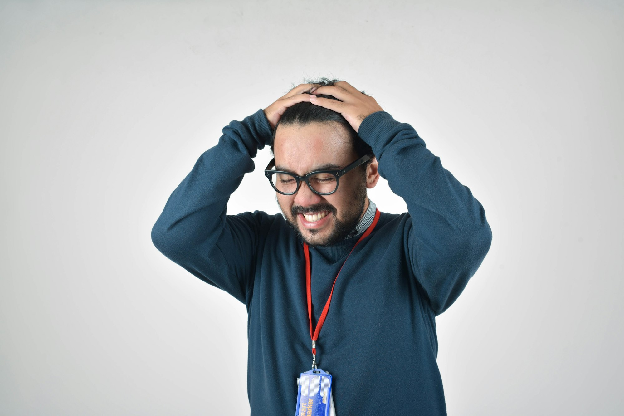 Why Doesnβt Anybody Talk About How Hard Love Is? 16 | Mania Africa | maniainc.com man in blue sweater | External stressors like job stresses can weigh down on your relationship | Love and Relationships Advice on Mania Africa