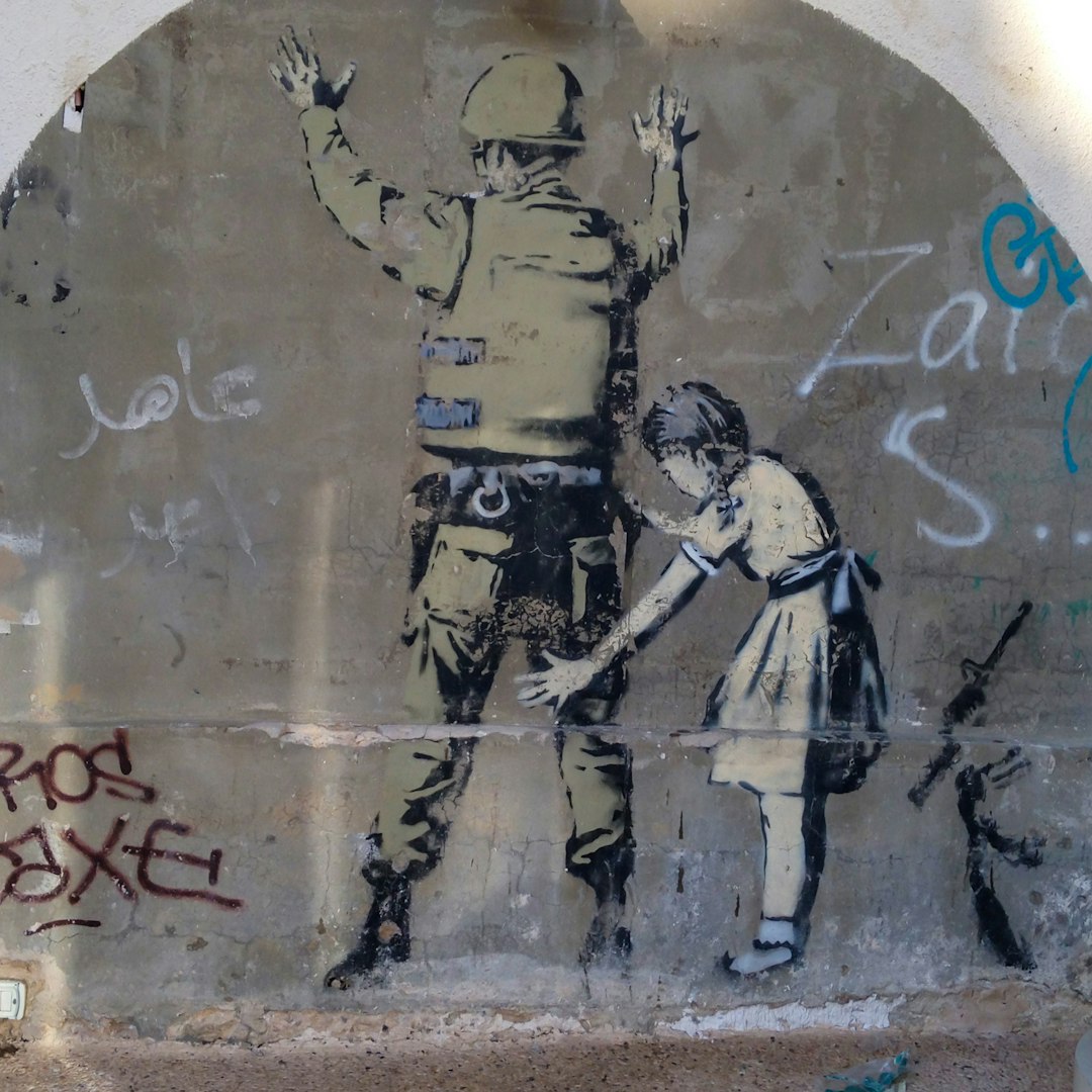 No Israel.. No More Violence.. Give Palestinians Their Country Back! 3 | Mania Africa | maniainc.com girl and soldier wall graphic