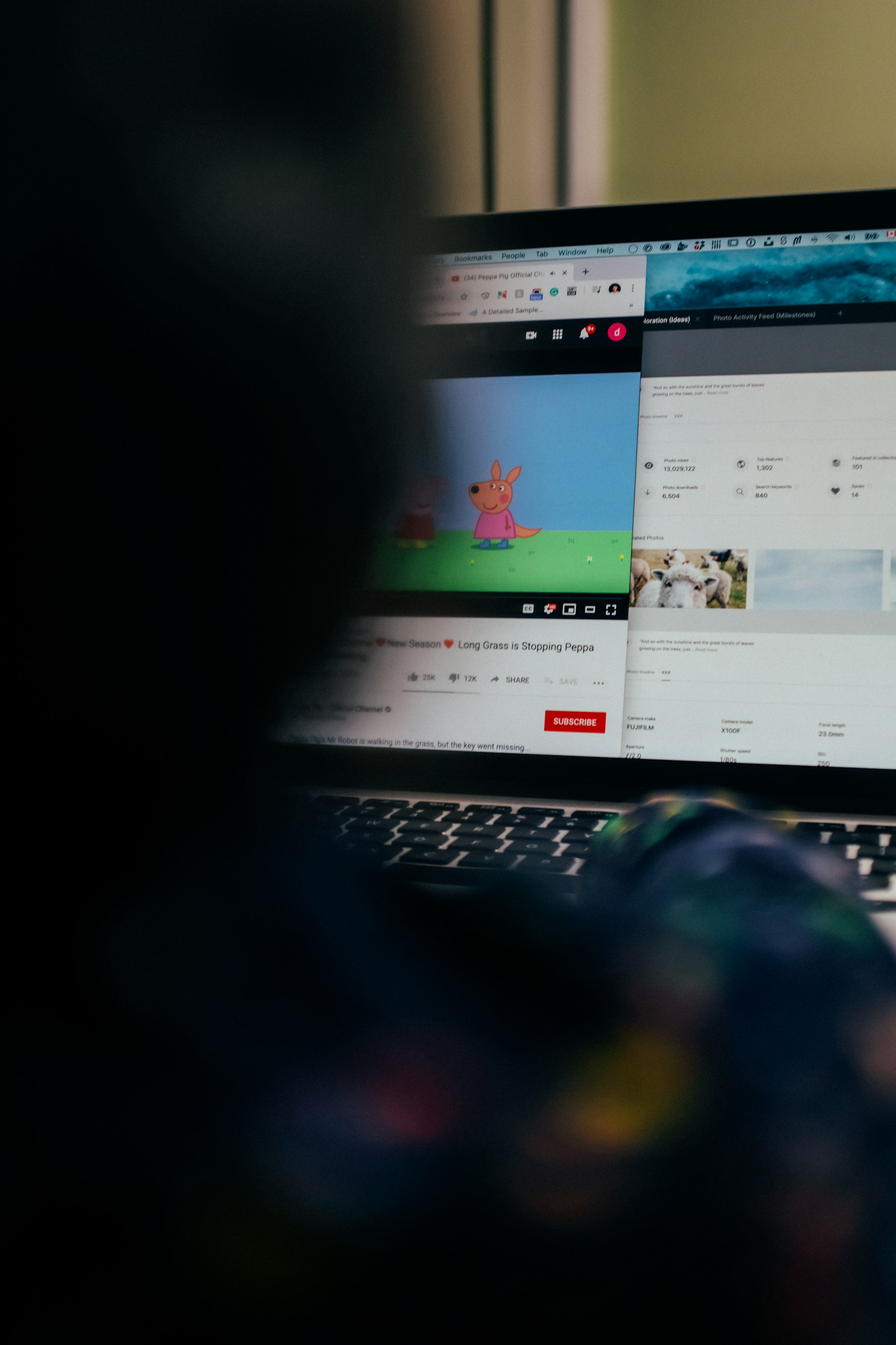 Mastering YouTube Titles: Boost Your Search Results with These Expert Tips 12 | Mania Africa | maniainc.com A person watching a YT video | Additional Hacks for YouTube Title Optimization | Mania Developers