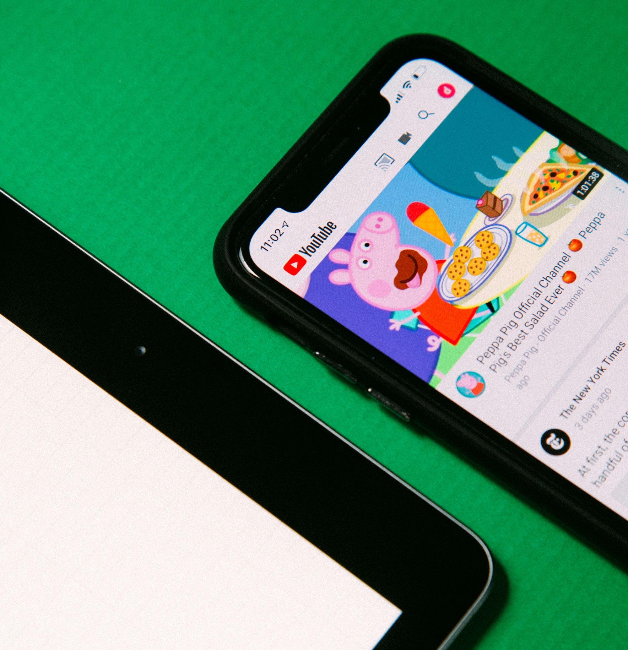Mastering YouTube Titles: Boost Your Search Results with These Expert Tips 8 | Mania Africa | maniainc.com A smartphone showing a YouTube video title | Key Tips for Optimizing YouTube Titles | Mania Guides