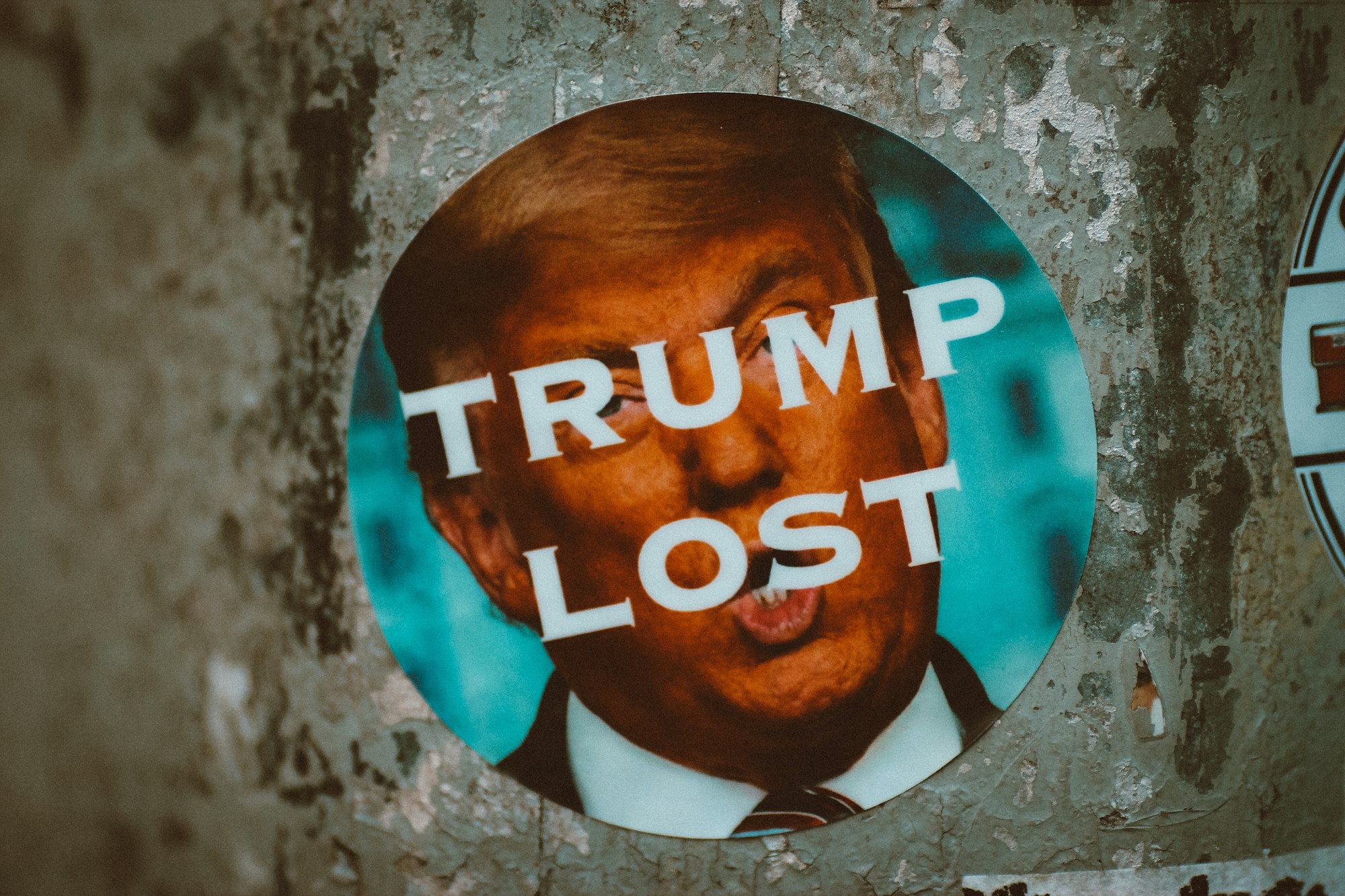 Conspiracy Theories and Extremism: Is a Civil War Looming in America? 14 | Mania Africa | maniainc.com A blue and white round plate saying
