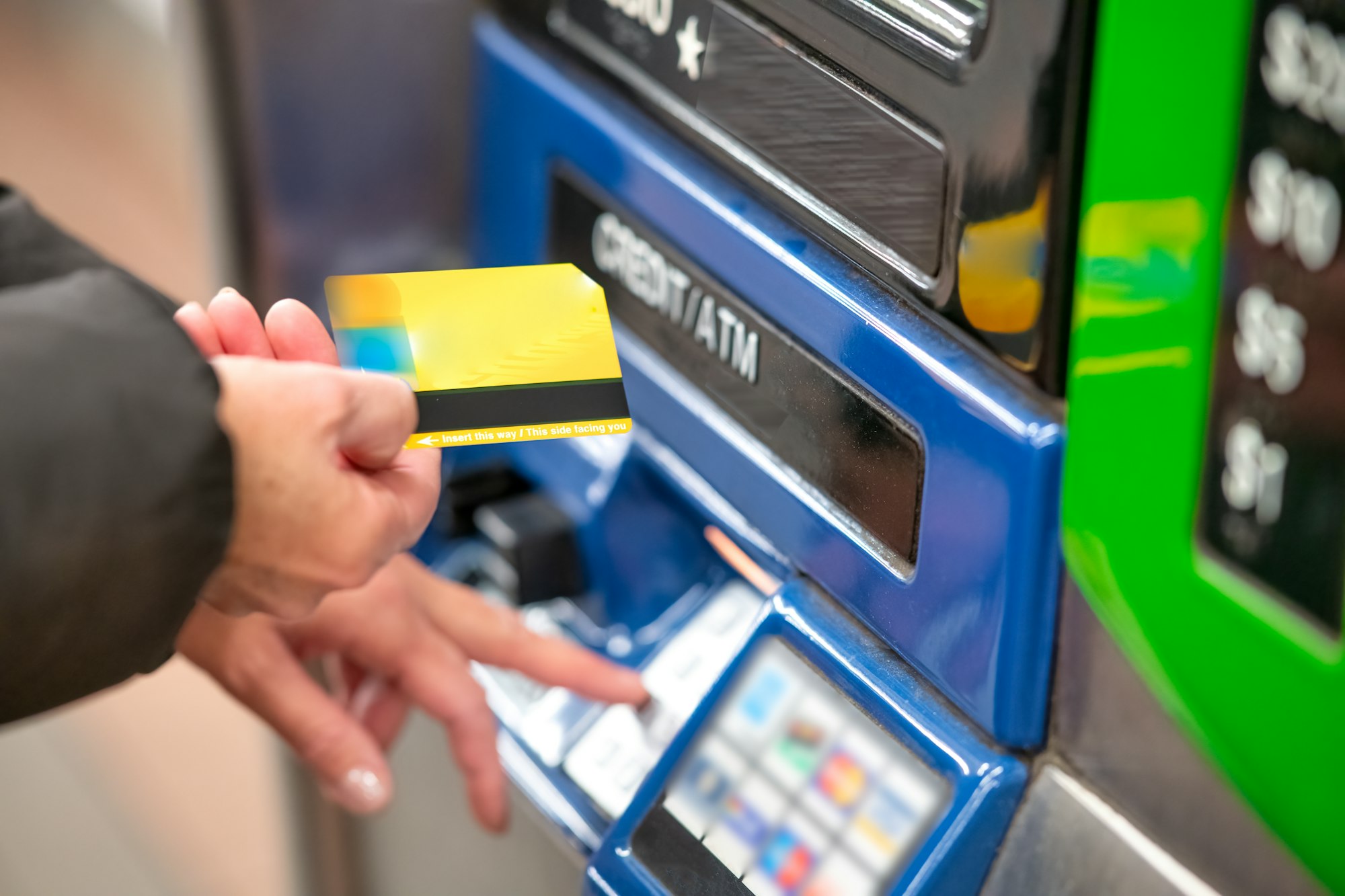 World's Biggest Data Breach?: Personal Information of 2.9 Billion Exposed 5 | Mania Africa | maniainc.com a person using a credit card to pay on a machine | Could This Be the World