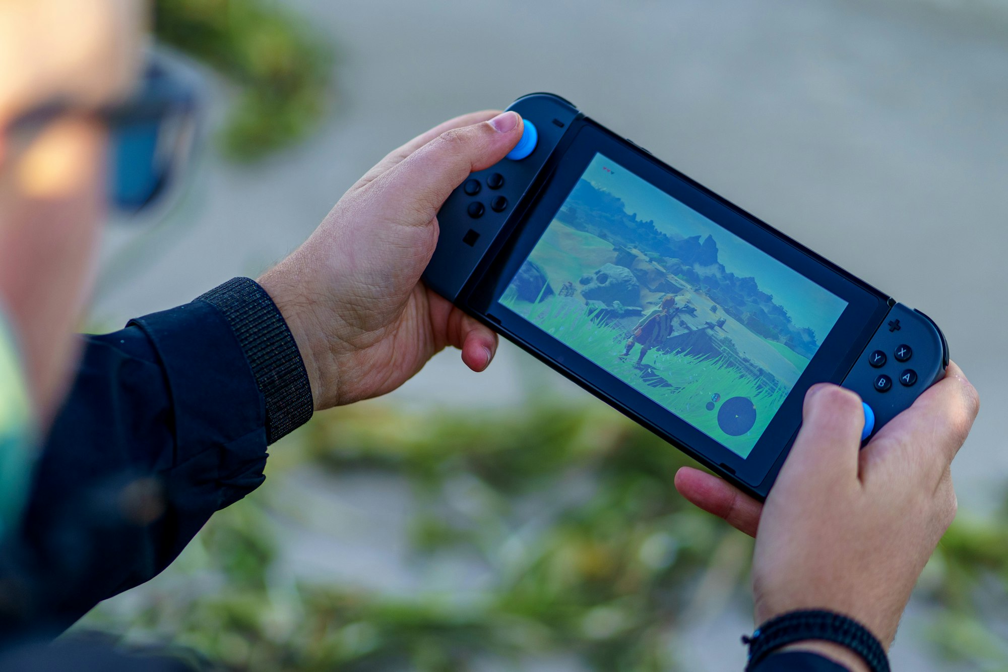 The Hidden Costs of Europe's Digital Gambling Explosion: Addiction, Exploitation, and the Quest for Reforms 4 | Mania Africa | maniainc.com a person playing a video game | Approaches by Gambling Companies to Rope in Gamblers | Mania Gaming