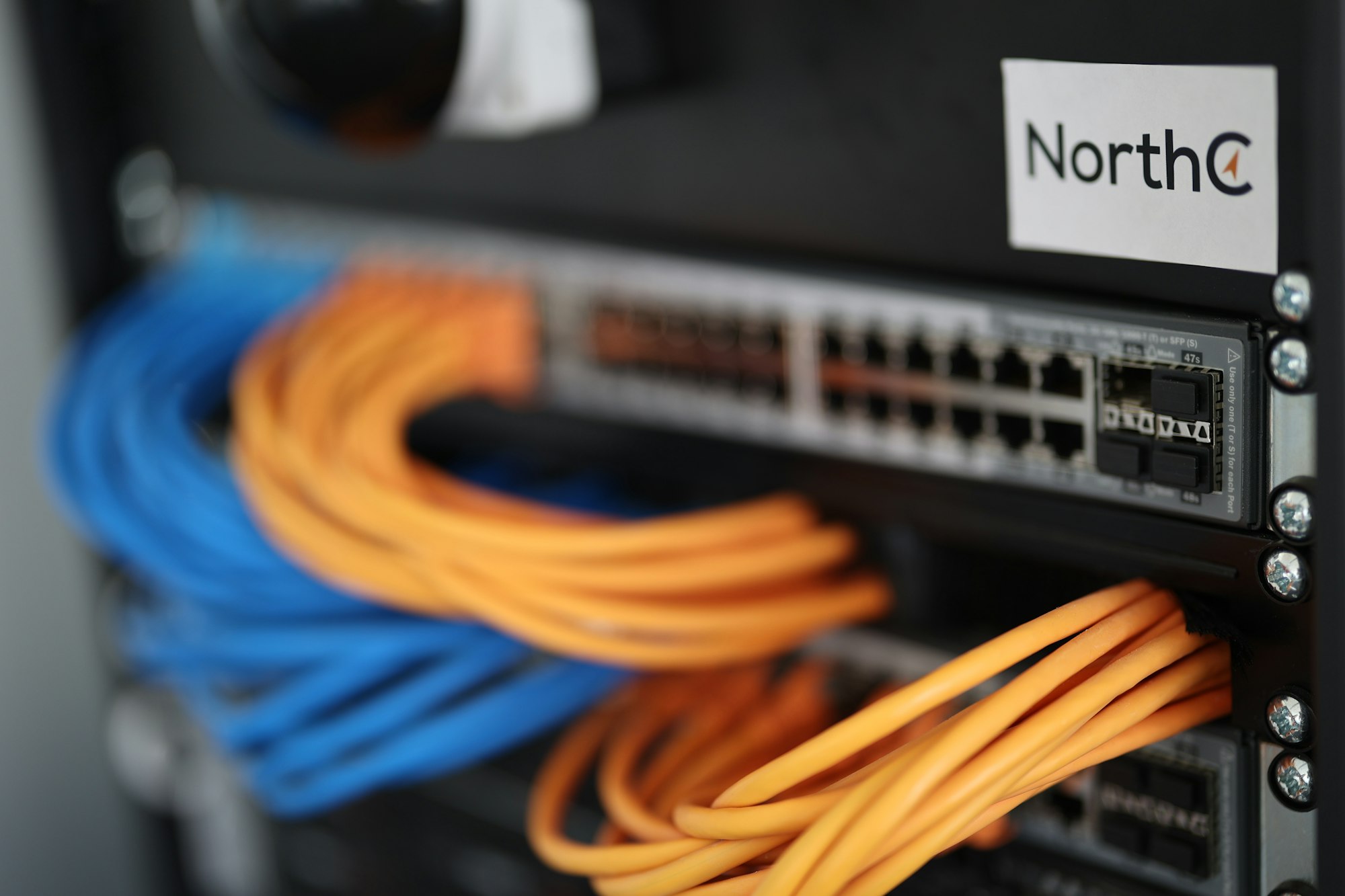 Choosing the Right Web Hosting Provider: A Comprehensive Guide to Finding Your Perfect Match 3 | Mania Africa | maniainc.com a close up of a network server