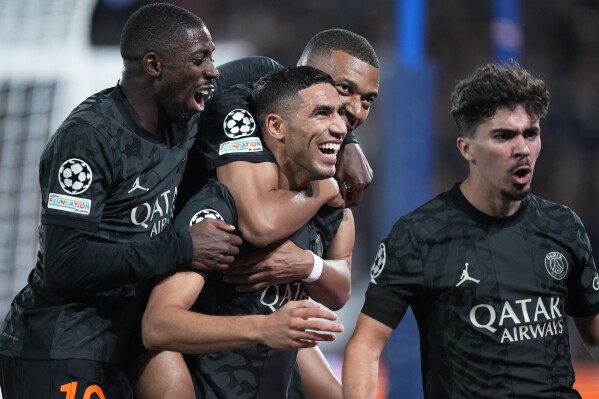 Mbappe, Hakimi, and teammate celebrating
